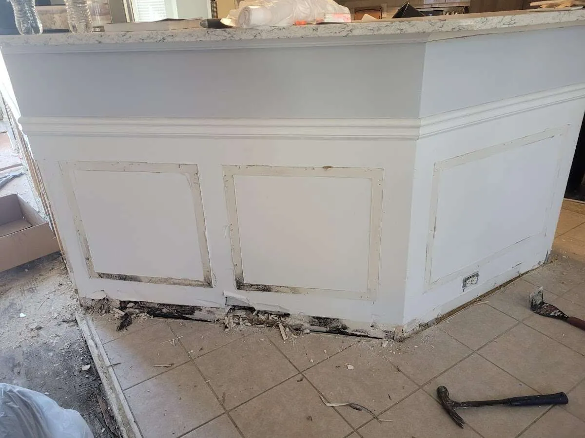 Water damage and mold on kitchen during Storm Damage Restoration in Perry